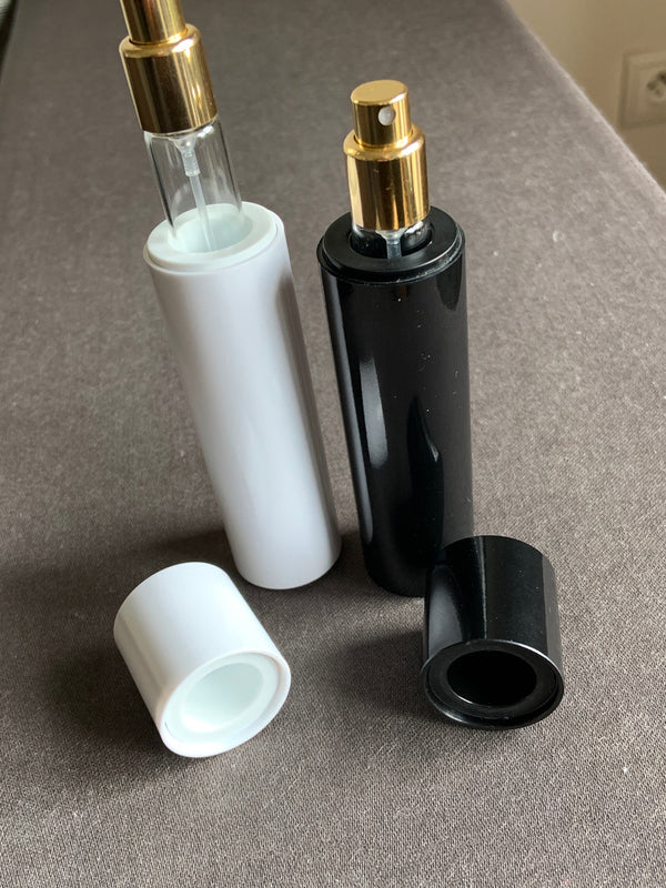 TRAVEL/PURSE PERFUME ATOMIZER: EXCHANGEABLE VIAL, CELLULOSE, BLACK AND WHITE