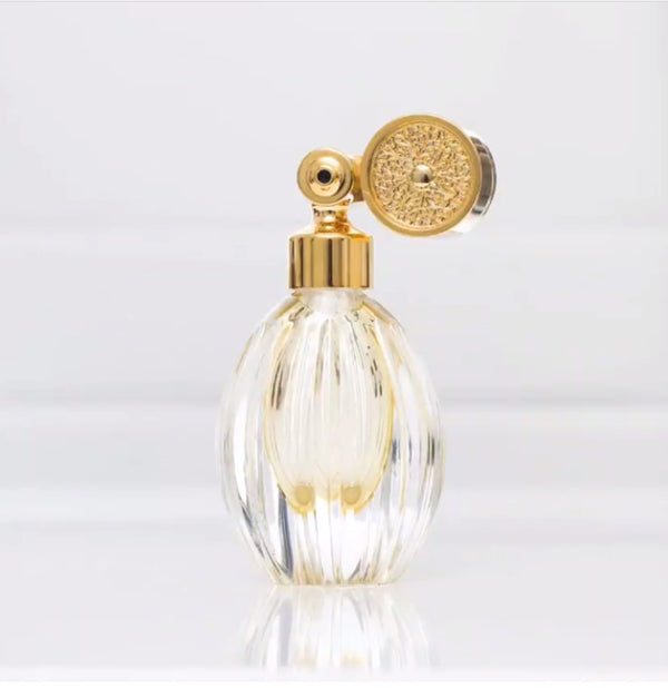 HOME COLLECTION CRYSTAL: GOLD PLATED ESCALE MOUNT, OVAL SHAPE WITH STRAIGHT GROOVES, CLEAR AND AMBER CRYSTAL FLACON